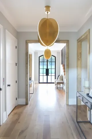 a view of a living room and bathroom