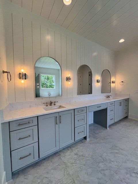 9493 Grand Haven Drive Brentwood, TN 37027 - Photo 31 of 37 a spacious bathroom with double vanity sinks and a large mirror
