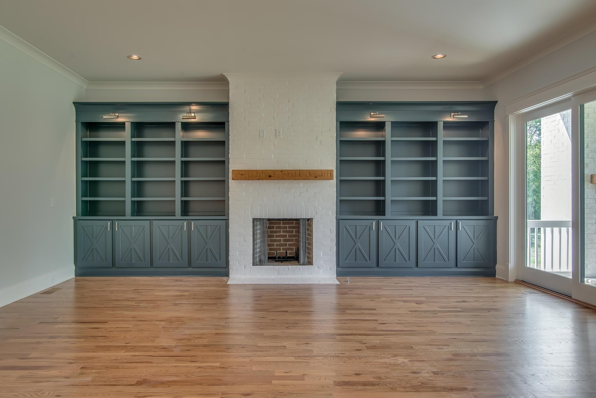 9493 Grand Haven Drive Brentwood, TN 37027 - Photo 36 of 37 a view of an empty room with wooden floor and a cabinet
