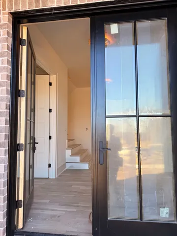 a view of living room with furniture and a window