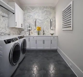 a utility room with cabinets
