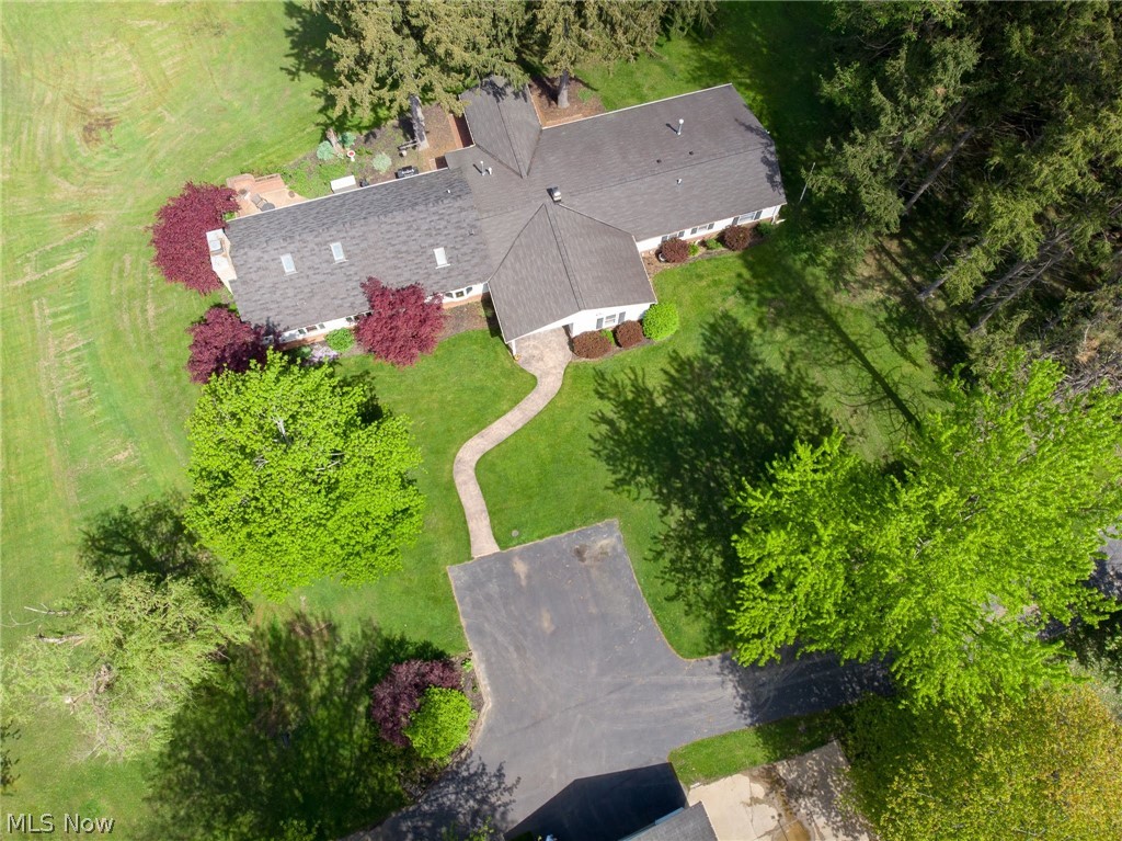 9377 Valley View Road Macedonia, OH 44056 - Photo 2 of 35 9377 Valley View Rd Macedonia OH 44056 GORGEOUS fully remodeled Ranch & 40x72 Barn on 3.5 acres! Huge 30'x28' Cathedral Great Room Wood accents & Fireplace wall open from the Completely Renovated professionally designed Kitchen & multiple seating areas, plenty of granite throughout. This 4 bedroom, 2.5 Bath Ranch boasts a great family layout all on 1 floor w/ Theater/Media Room, Front Cozy Family Room & 2nd Fireplace, Screened Rear Porch, Front Enclosed Entry, Lots of Storage Cabinetry, Laundry Room!