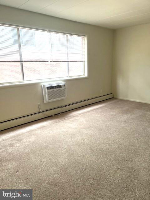 114 Park Avenue, Unit 5B Swarthmore, PA 19081 - Photo 2 of 9 a view of an empty room with a window
