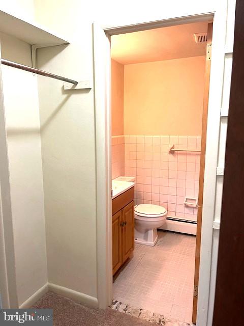 114 Park Avenue, Unit 5B Swarthmore, PA 19081 - Photo 6 of 9 a bathroom with a toilet a sink and a shower