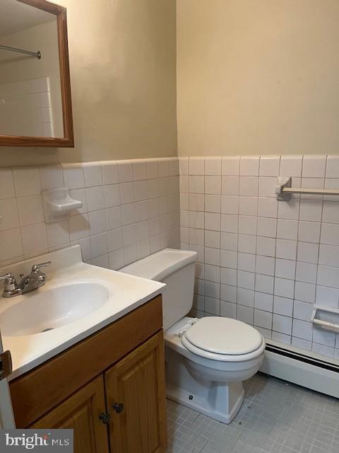 114 Park Avenue, Unit 5B Swarthmore, PA 19081 - Photo 8 of 9 a bathroom with a sink a toilet and a mirror