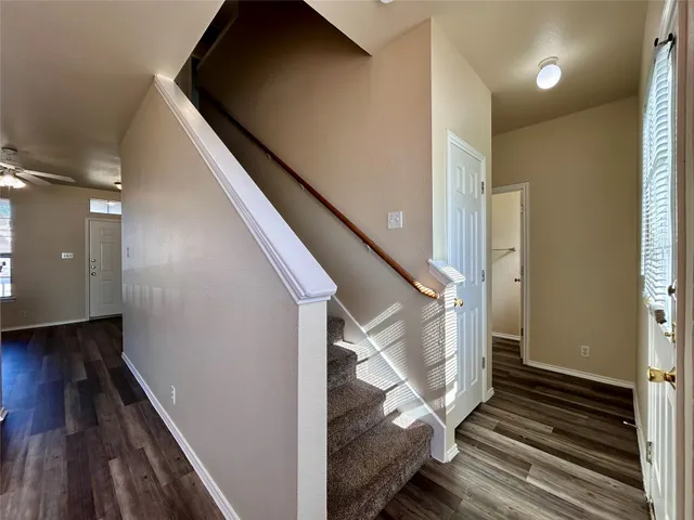 a view of a hallway with closet