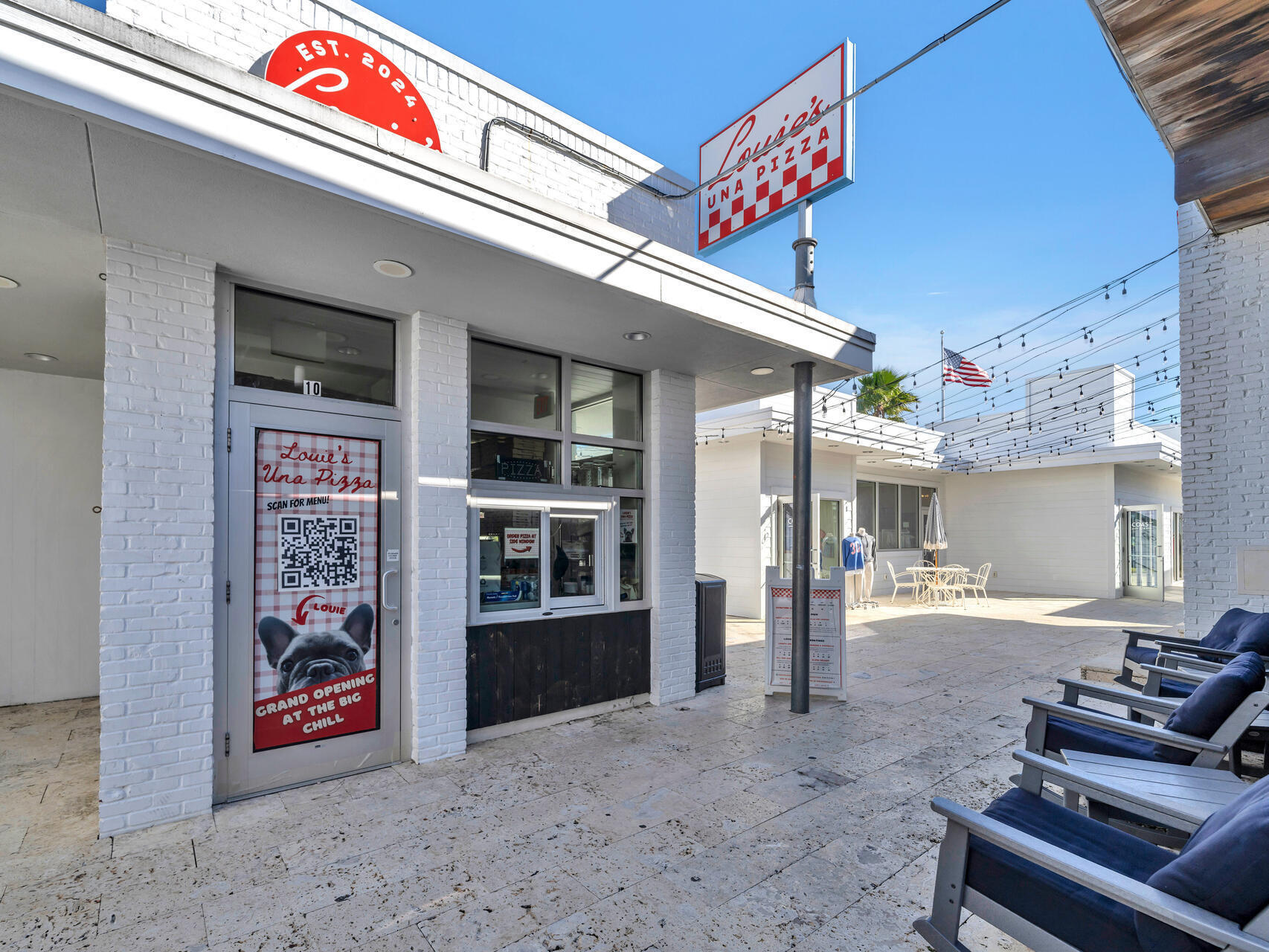 79 Milestone Dr Inlet Beach, Unit C Inlet Beach, FL 32461 - Photo 38 of 56 a front view of a building with seating space