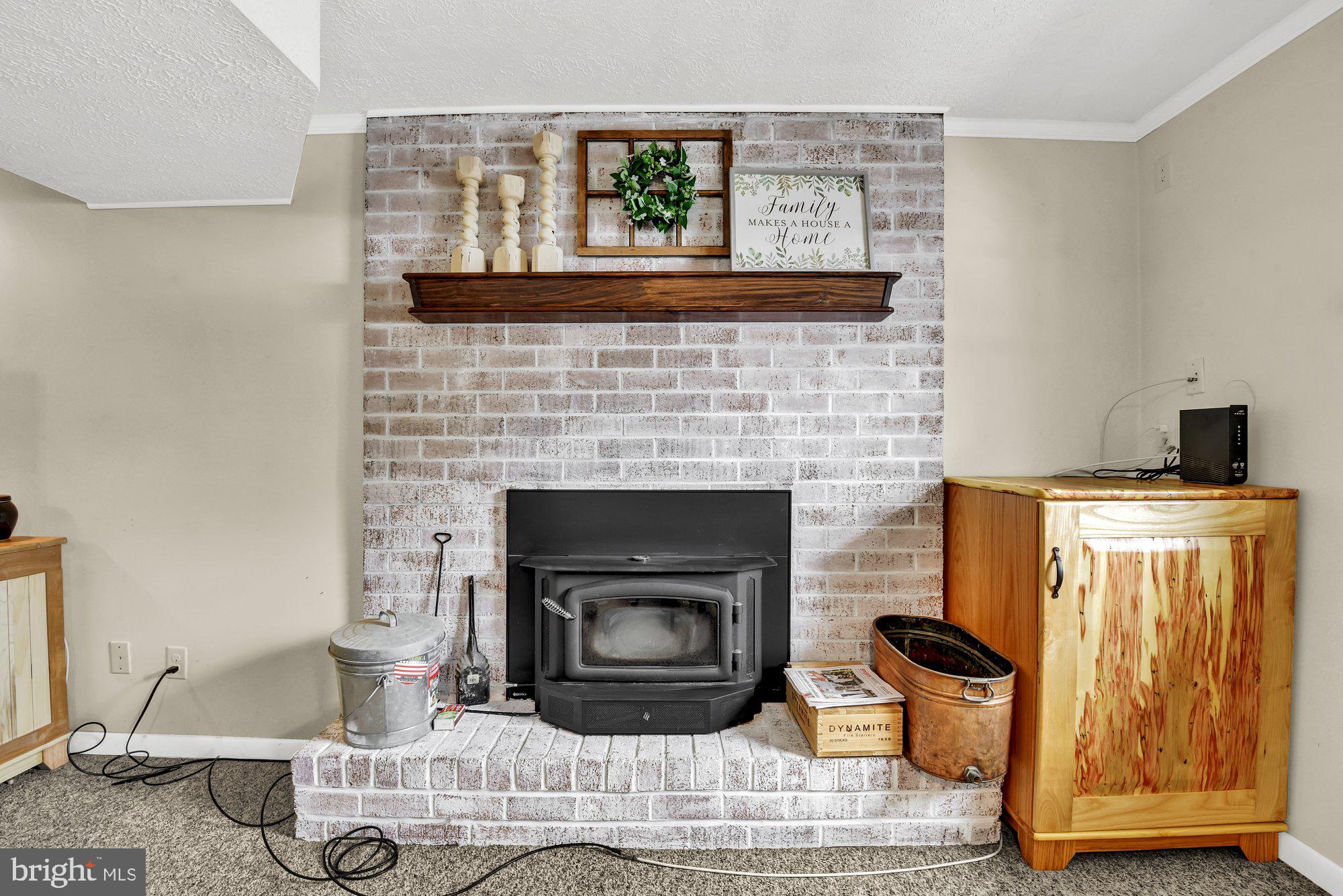 806 Uniontown Road Westminster, MD 21158 - Photo 6 of 10 a living room with furniture and a fireplace