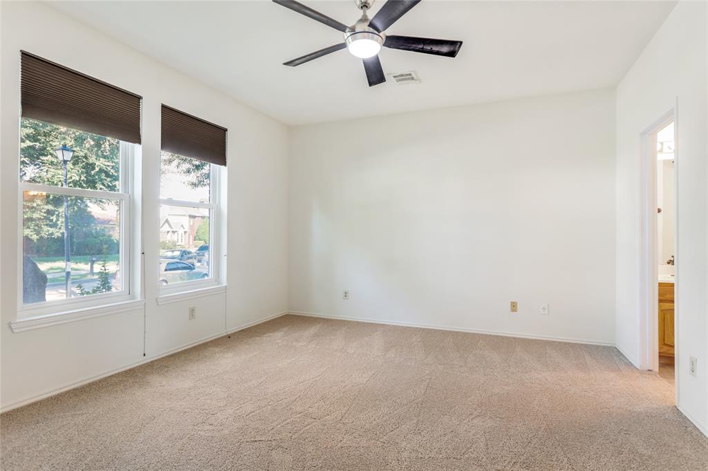 2151 Falcon Ridge Drive Carrollton, TX 75010 - Photo 22 of 40 a view of an empty room with a window