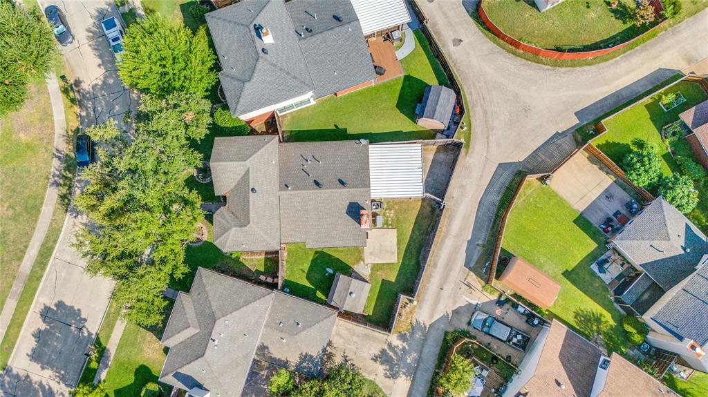 2151 Falcon Ridge Drive Carrollton, TX 75010 - Photo 38 of 40 an aerial view of residential house with outdoor space and swimming pool