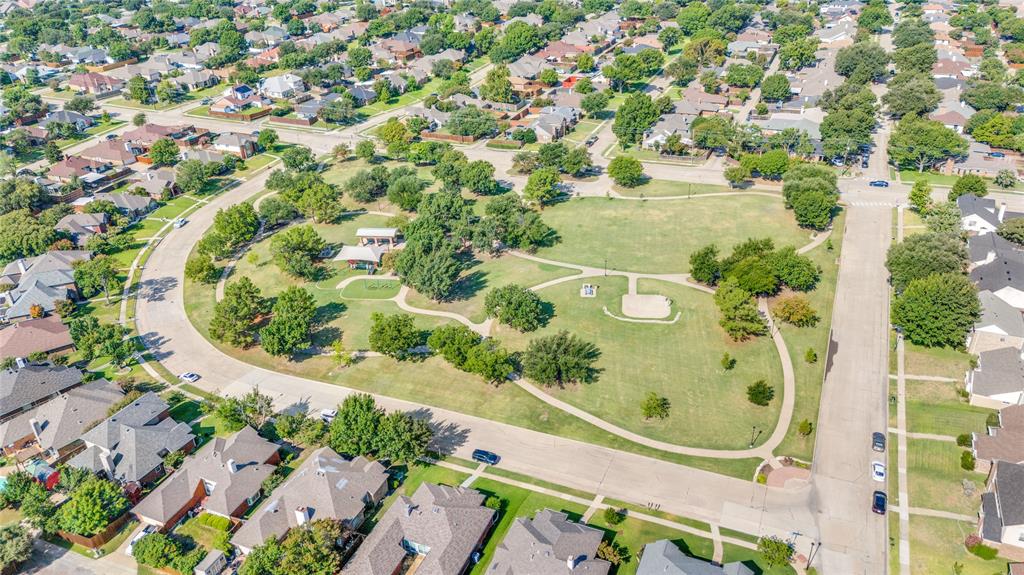 2151 Falcon Ridge Drive Carrollton, TX 75010 - Photo 40 of 40 an aerial view of a residential houses with yard