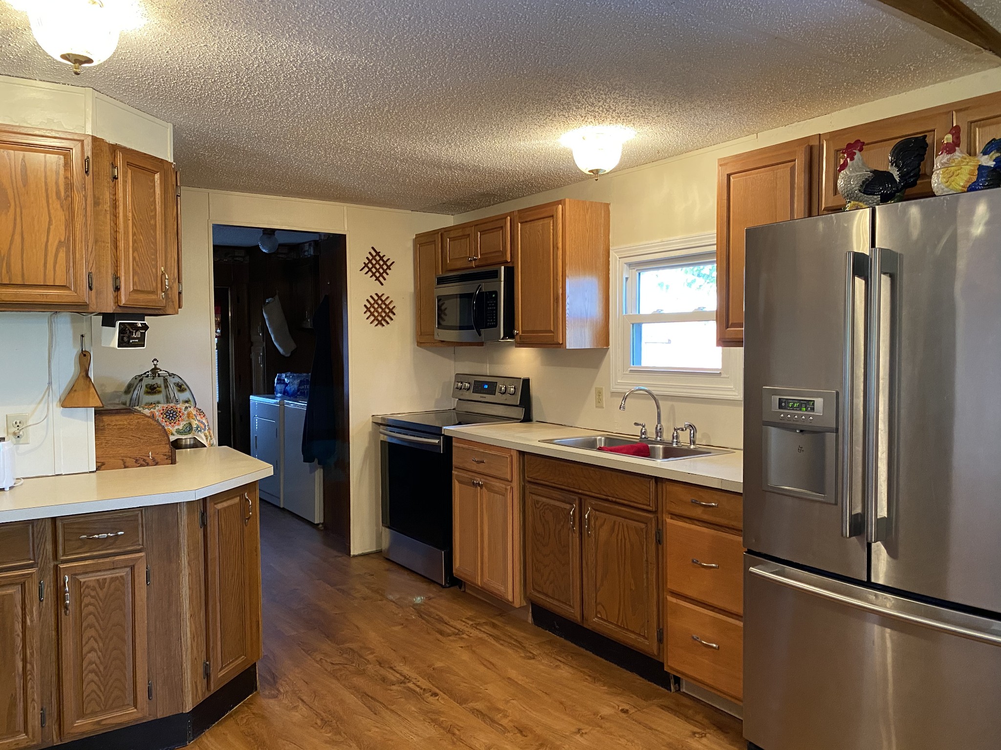 4008 Green Road Springfield, TN 37172 - Photo 13 of 24 a kitchen with a refrigerator stove and sink