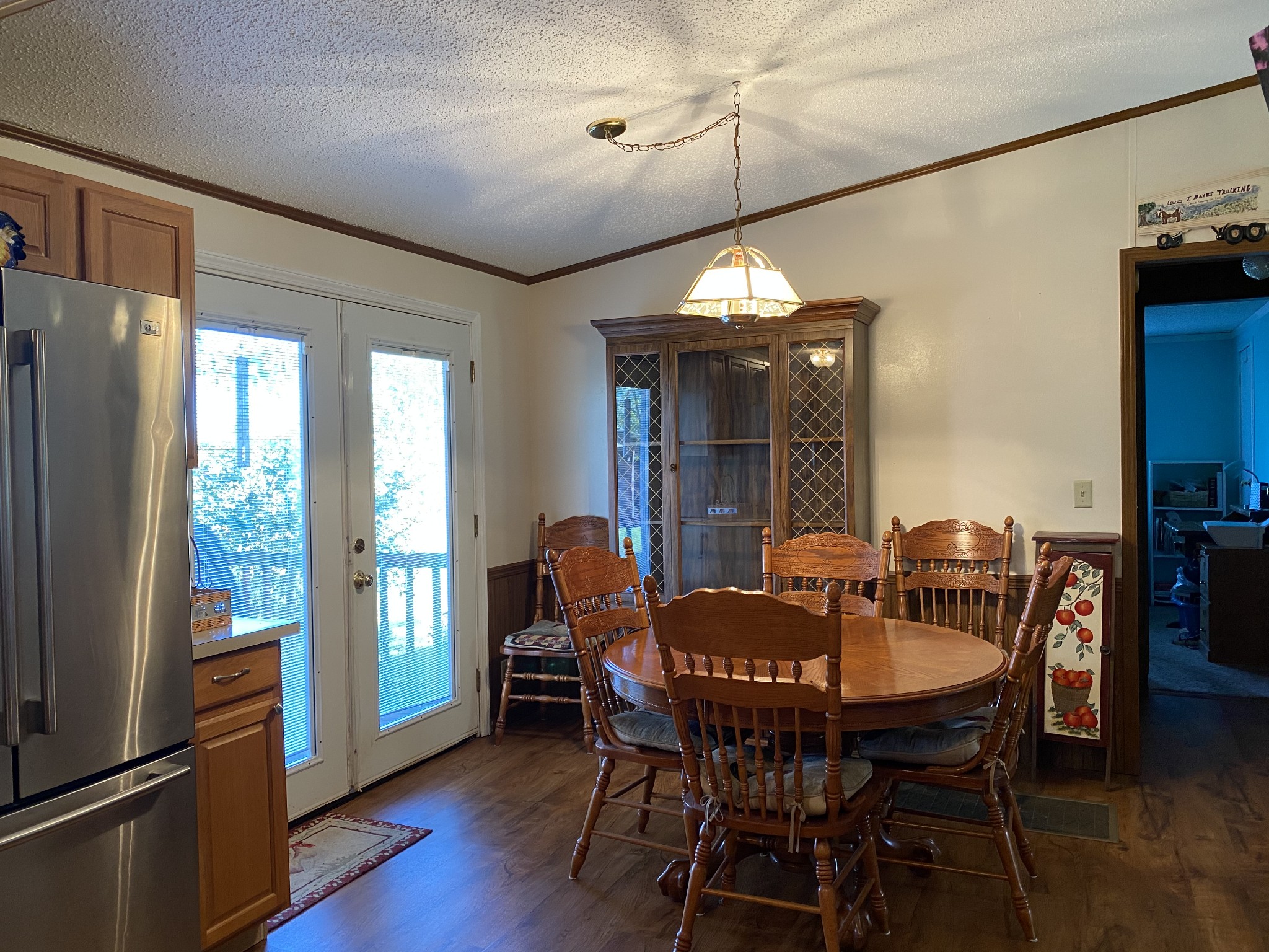 4008 Green Road Springfield, TN 37172 - Photo 16 of 24 a view of a dining room with furniture window and wooden floor