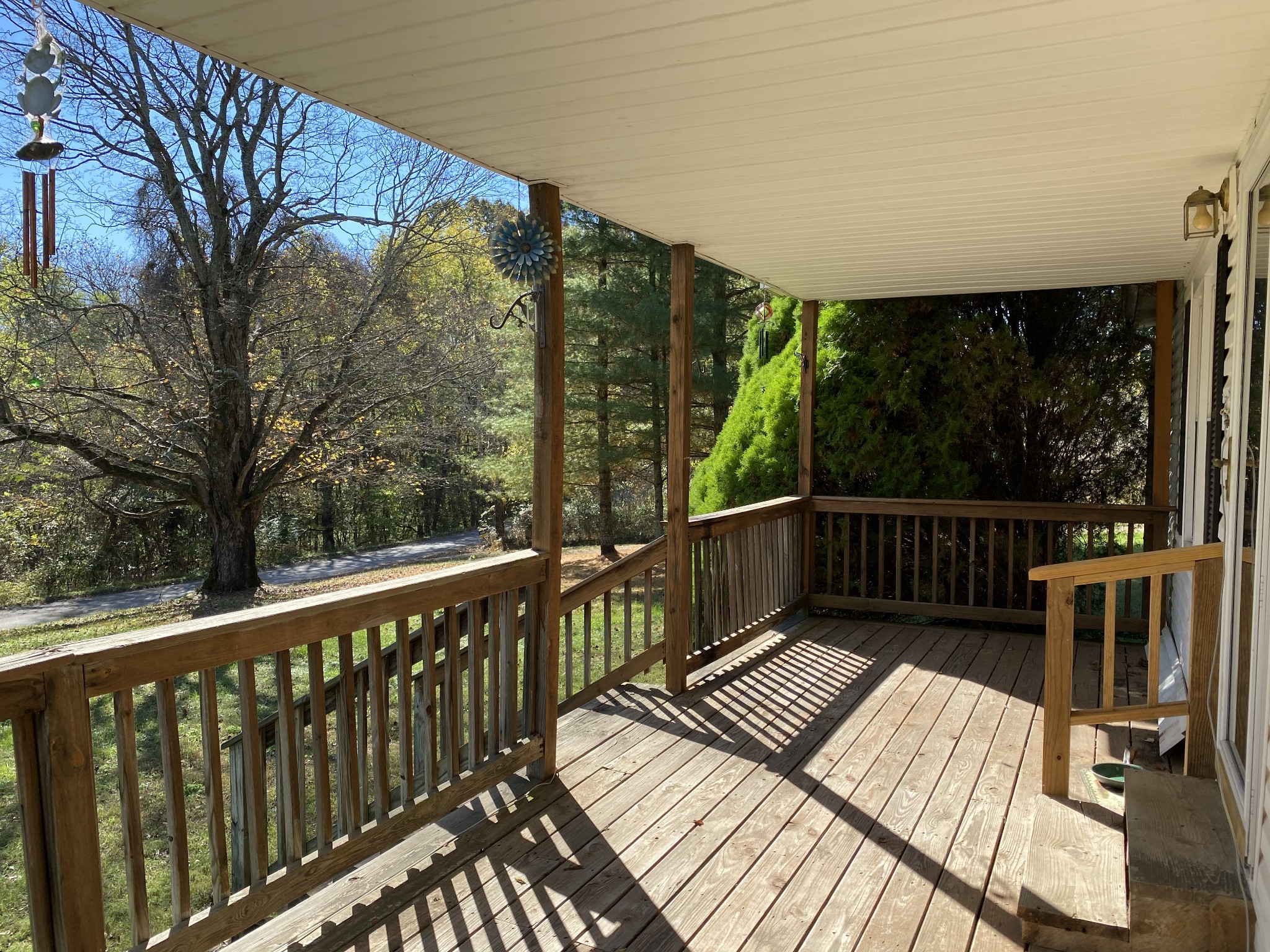 4008 Green Road Springfield, TN 37172 - Photo 10 of 24 a view of balcony with wooden floor and outdoor seating