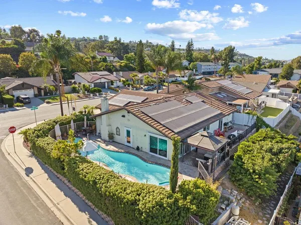 a view of a house with a big yard