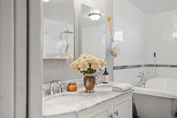 a bathroom with a sink and a bathtub