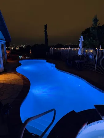 a view of a balcony with two chairs