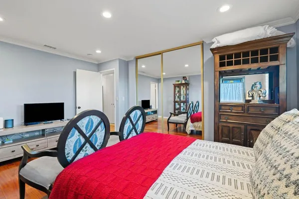 a room with furniture and wooden floor