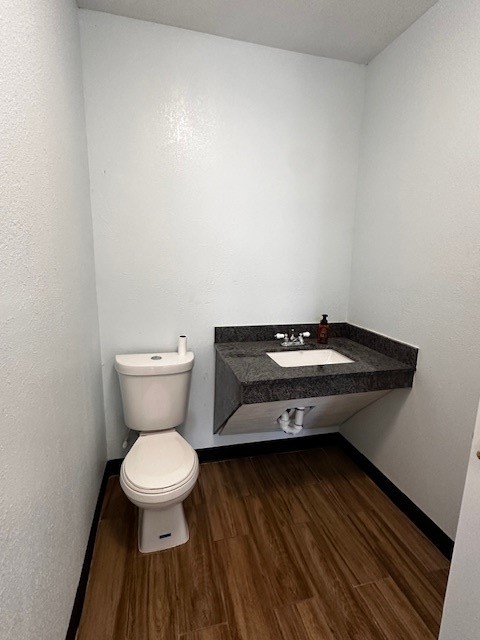 1326 Almeda Genoa Road Houston, TX 77047 - Photo 15 of 24 a bathroom with a sink and a toilet