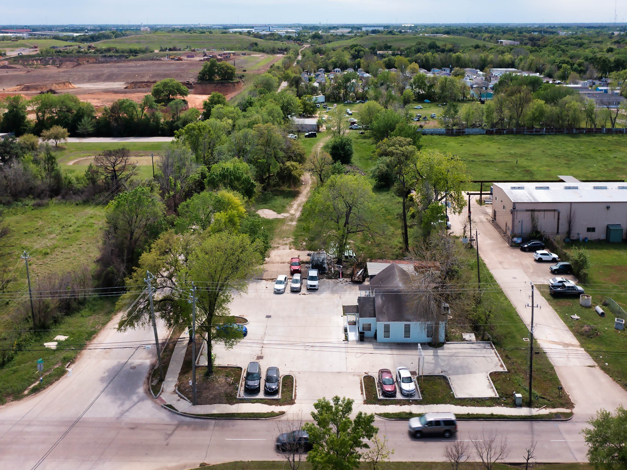 1326 Almeda Genoa Road Houston, TX 77047 - Photo 5 of 24 an aerial view of a house with garden space and lake view