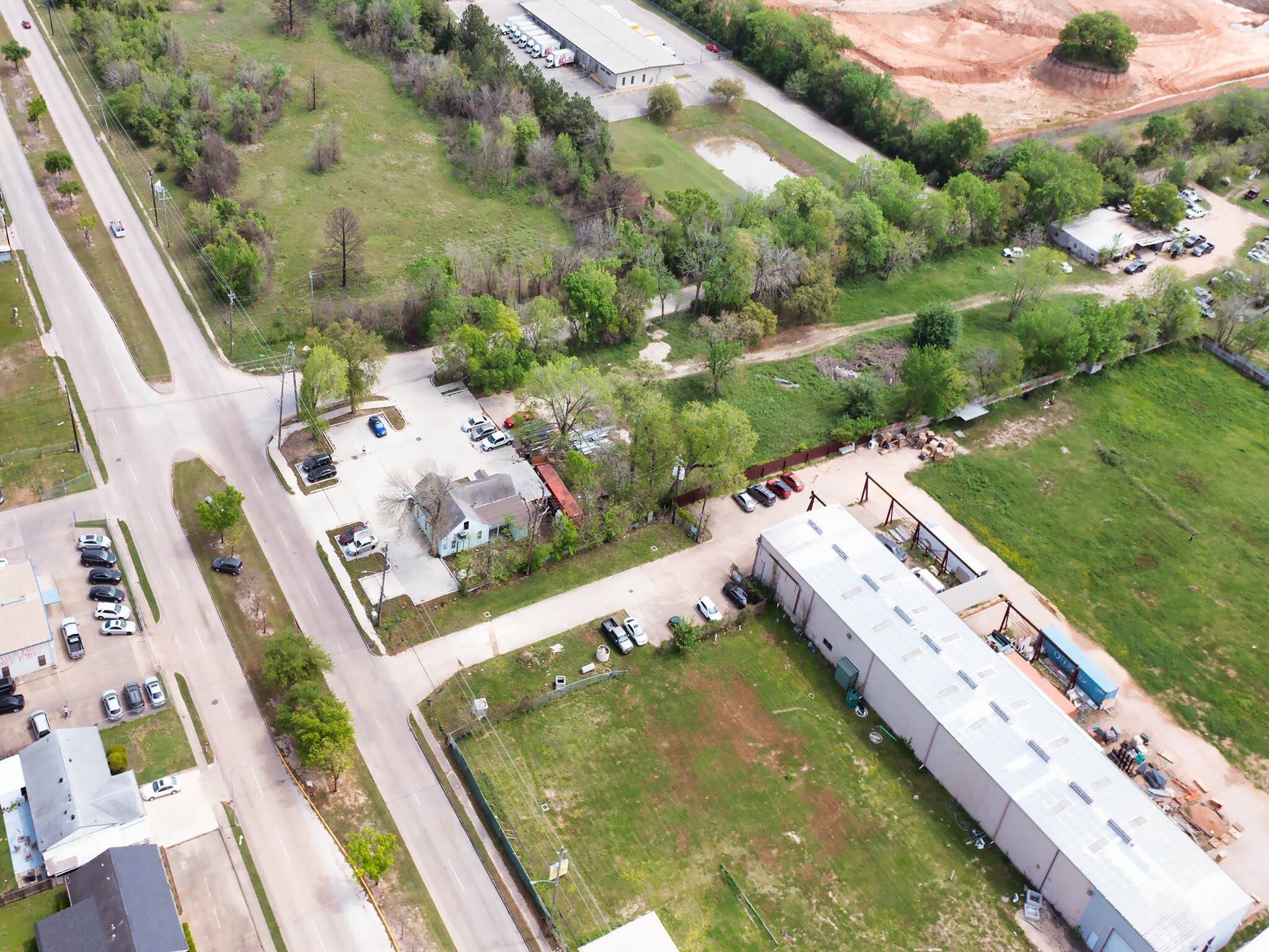 1326 Almeda Genoa Road Houston, TX 77047 - Photo 6 of 24 an aerial view of a pool yard lake and outdoor seating