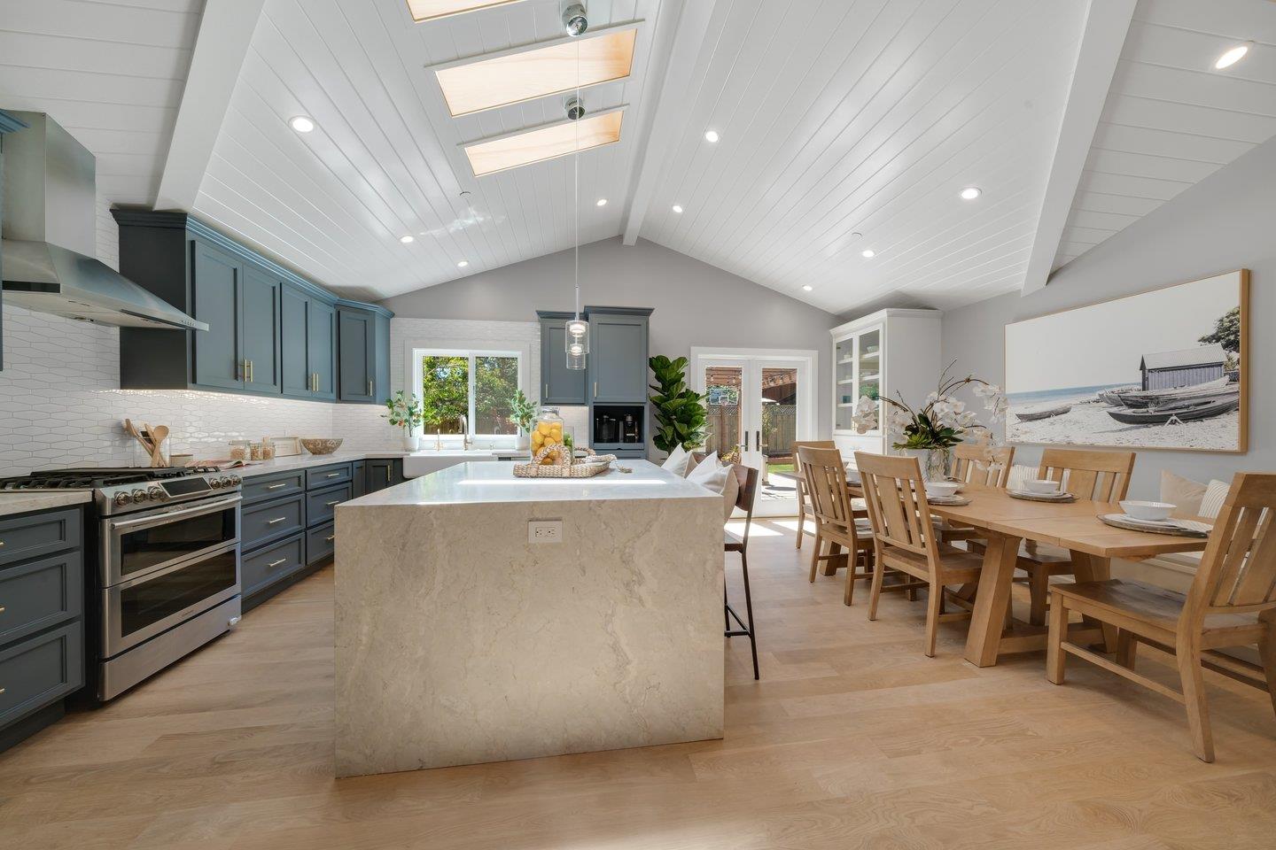 7 Del Monte Place San Mateo, CA 94403 - Photo 1 of 16 a large kitchen with stainless steel appliances lots of counter top space