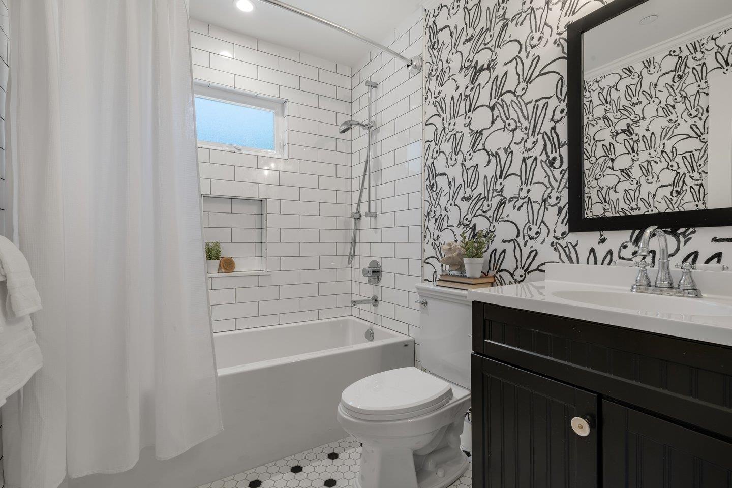 7 Del Monte Place San Mateo, CA 94403 - Photo 12 of 16 a bathroom with a sink toilet and shower