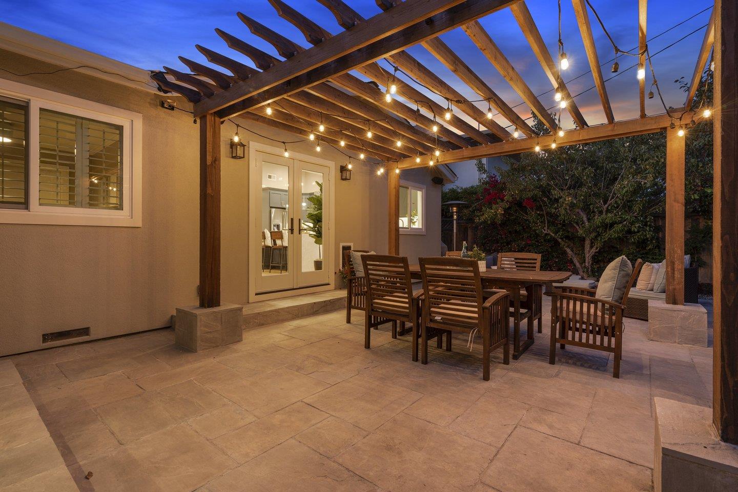 7 Del Monte Place San Mateo, CA 94403 - Photo 13 of 16 a view of a dinning table and chairs in the patio