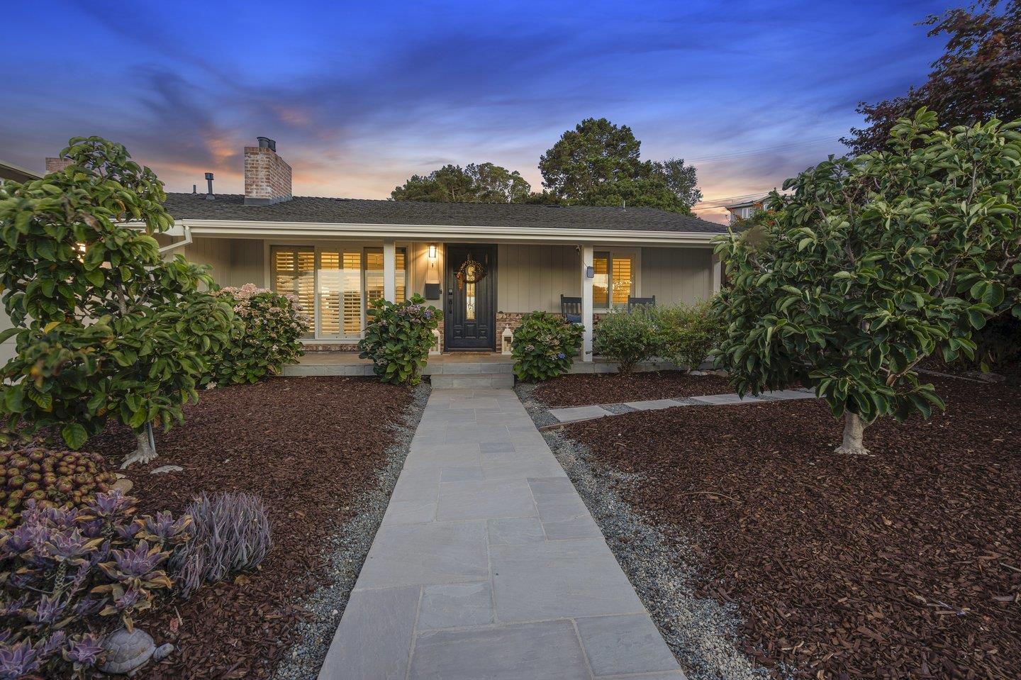 7 Del Monte Place San Mateo, CA 94403 - Photo 16 of 16 a front view of a house with a yard and potted plants