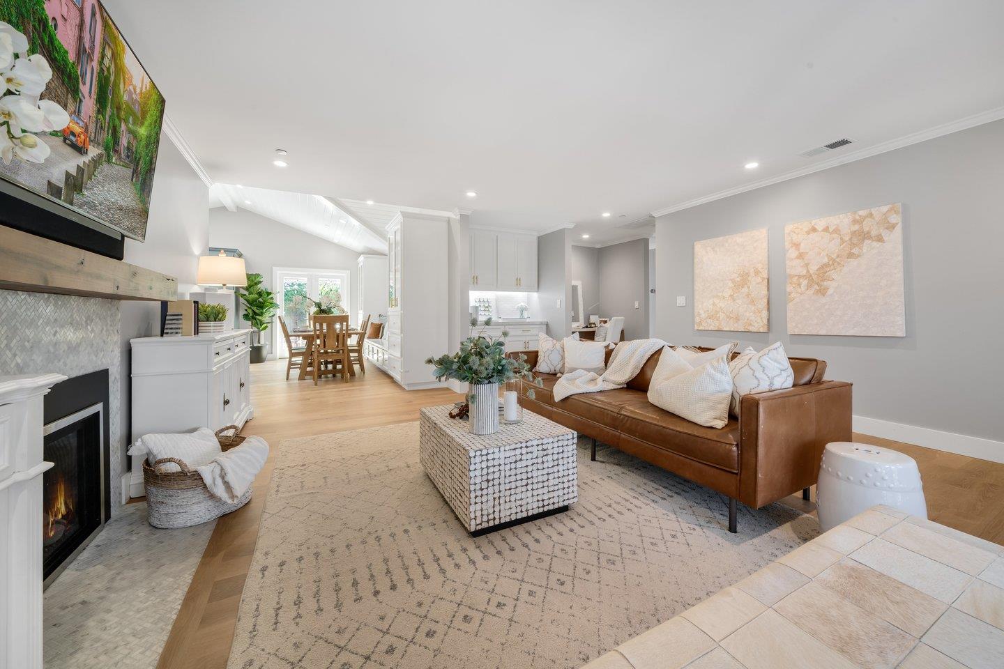 7 Del Monte Place San Mateo, CA 94403 - Photo 4 of 16 a living room with furniture and a fireplace