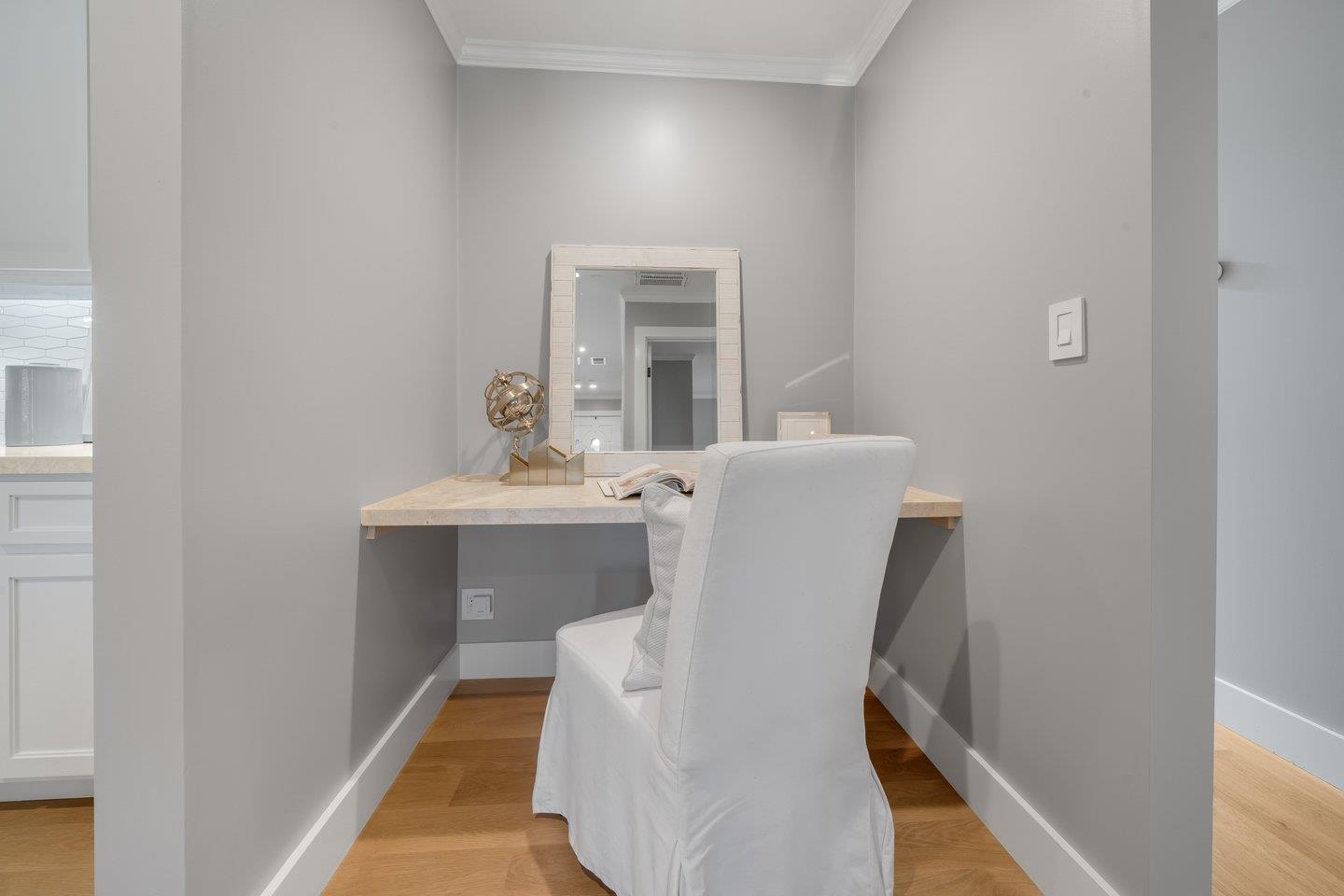 7 Del Monte Place San Mateo, CA 94403 - Photo 6 of 16 a workspace room with wooden floor and mirror