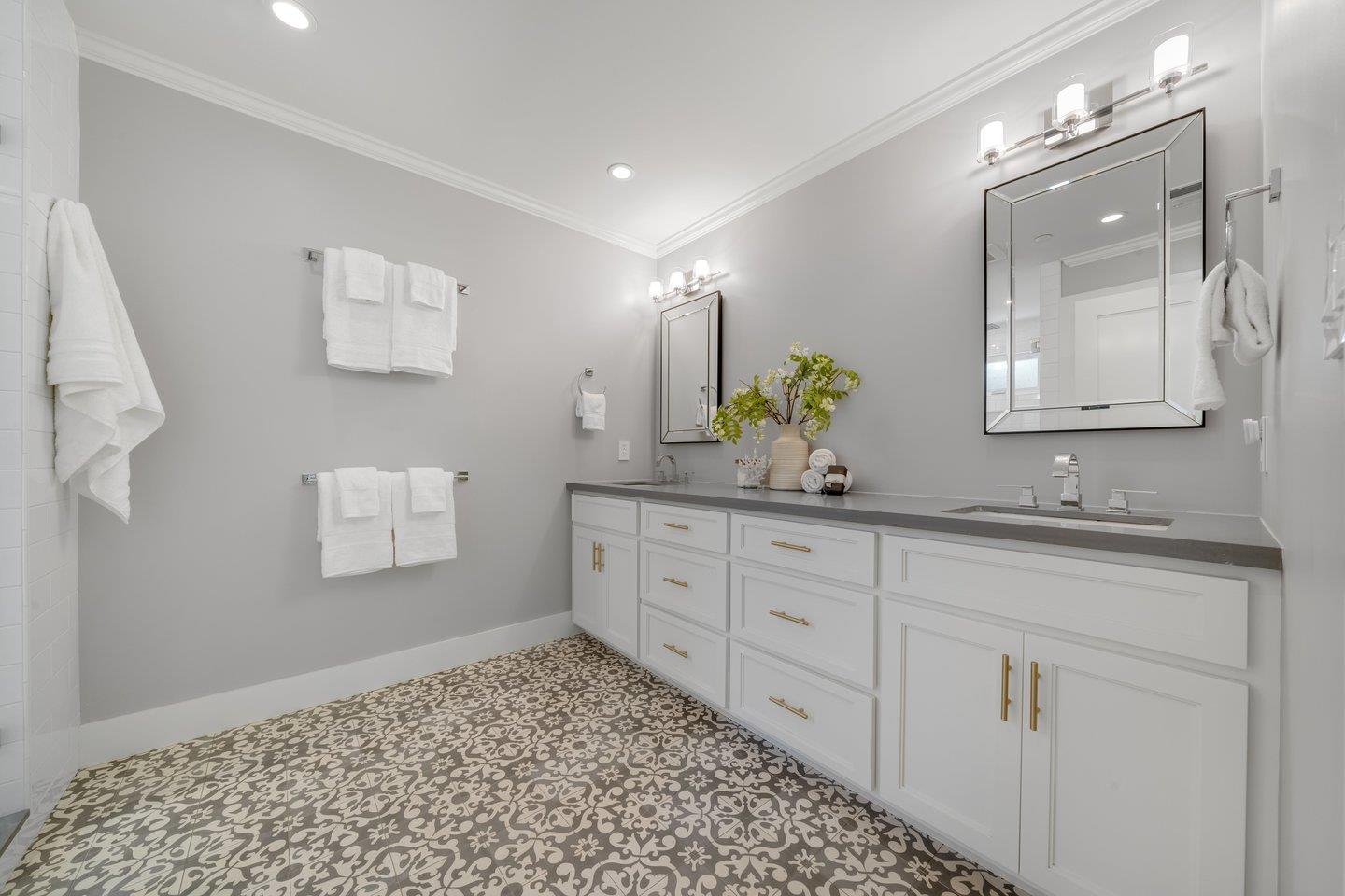 7 Del Monte Place San Mateo, CA 94403 - Photo 8 of 16 a spacious bathroom with a double vanity sink and a mirror