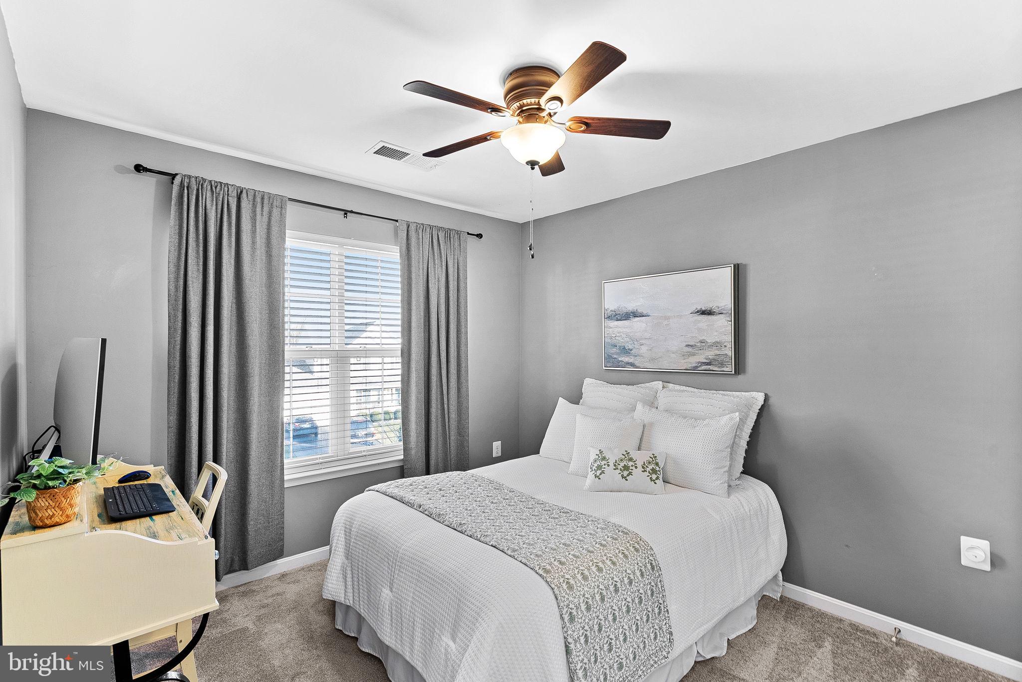 809 Devonshire Circle Purcellville, VA 20132 - Photo 24 of 36 a bedroom with a bed and a window