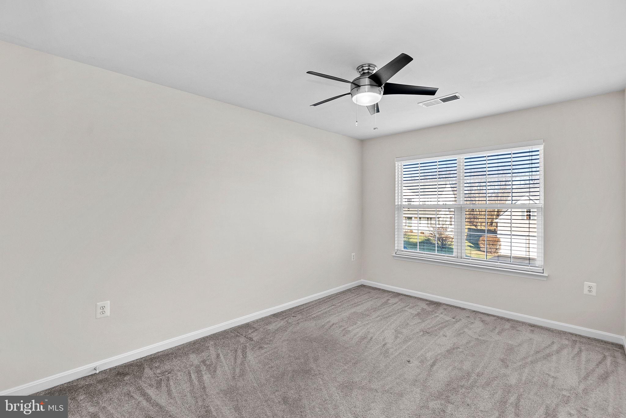 809 Devonshire Circle Purcellville, VA 20132 - Photo 25 of 36 a view of an empty room with a window