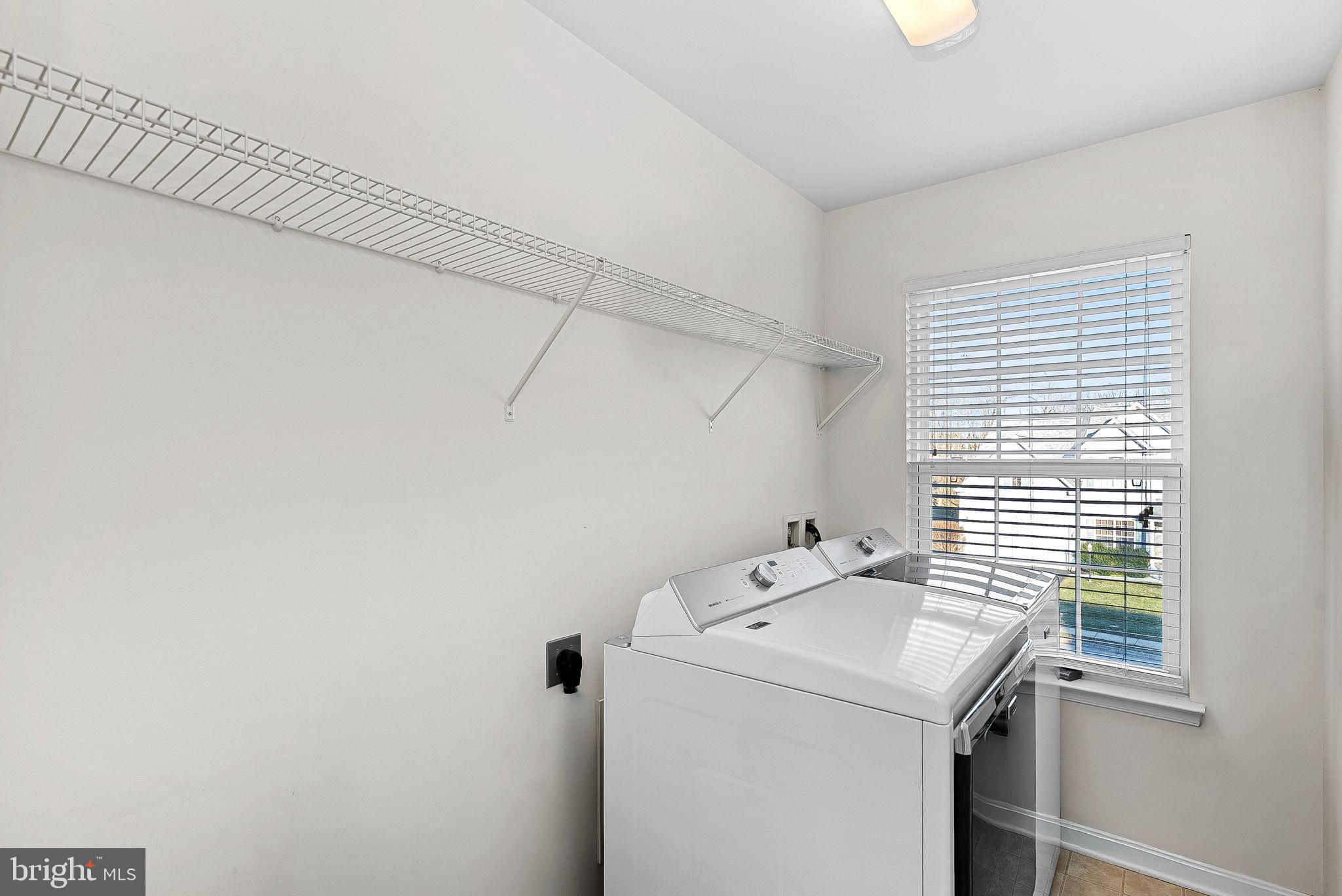 809 Devonshire Circle Purcellville, VA 20132 - Photo 28 of 36 a utility room with dryer and washer