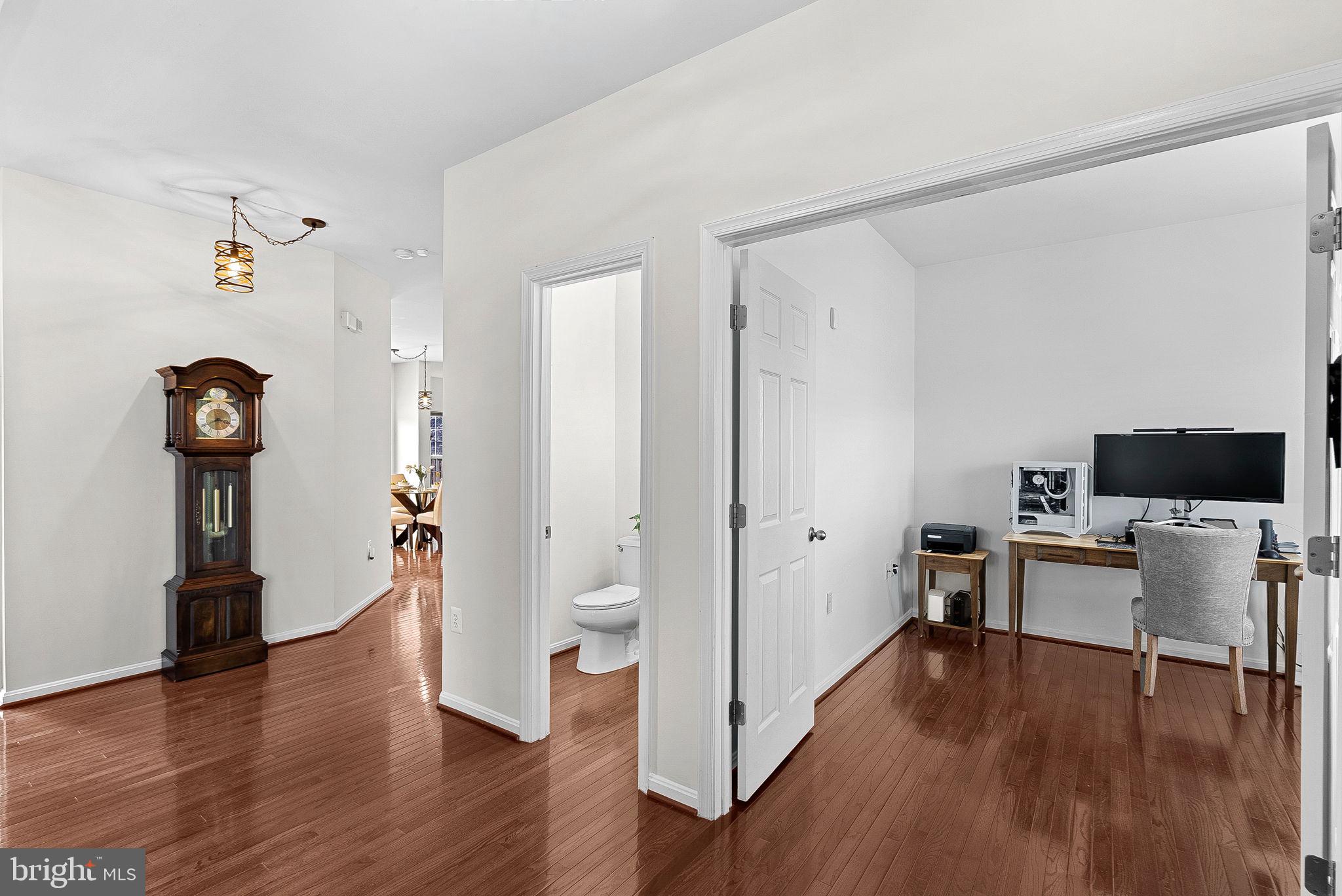 809 Devonshire Circle Purcellville, VA 20132 - Photo 5 of 36 a view of a workspace with wooden floor and a window