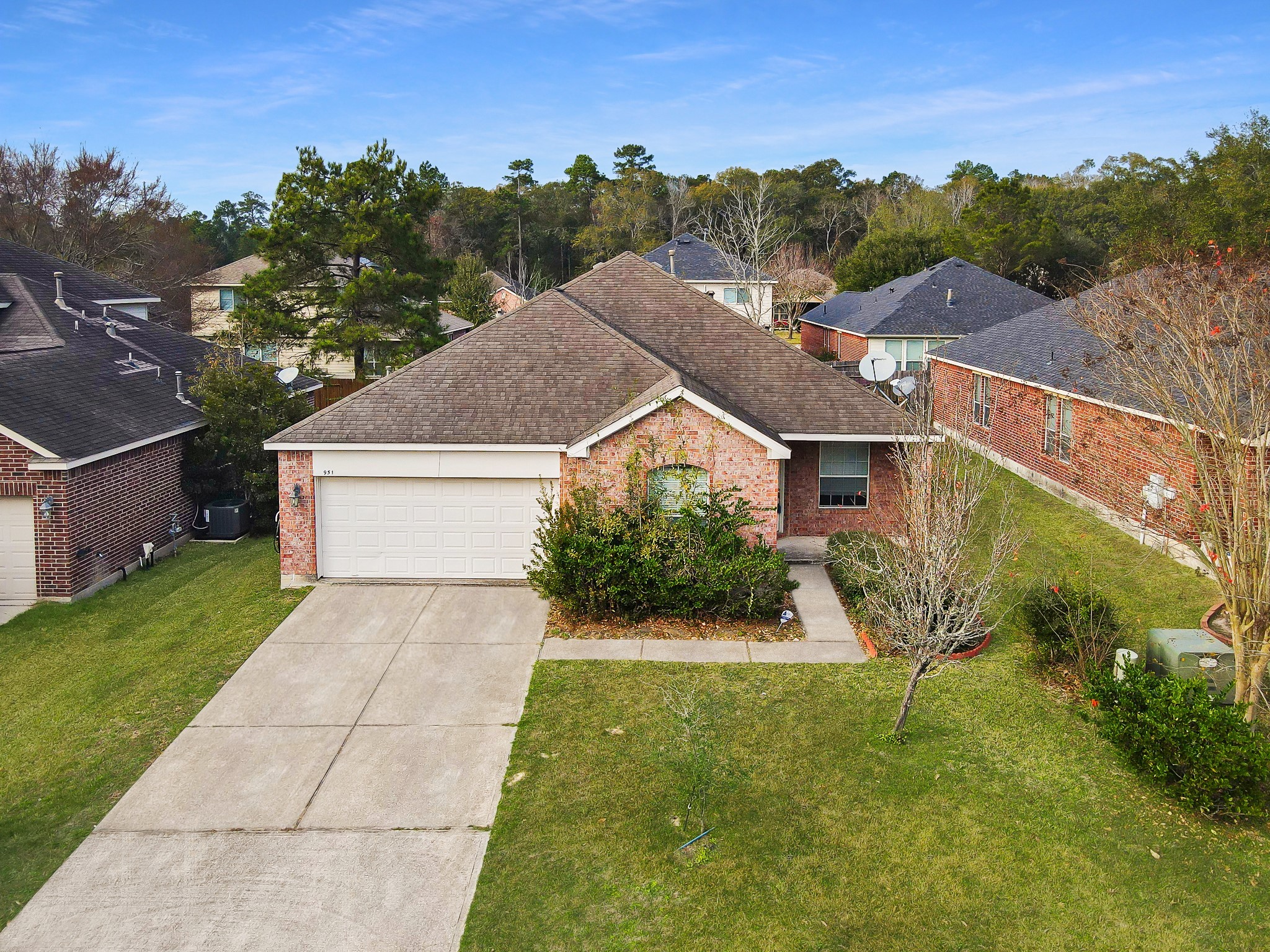 a aerial view of a house with a yard