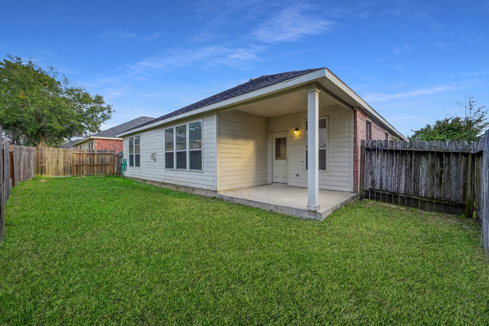951 Crannog Way Conroe, TX 77301 - Photo 35 of 43 a view of a house with a yard