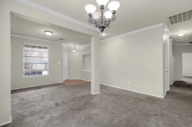 a view of a livingroom with a chandelier