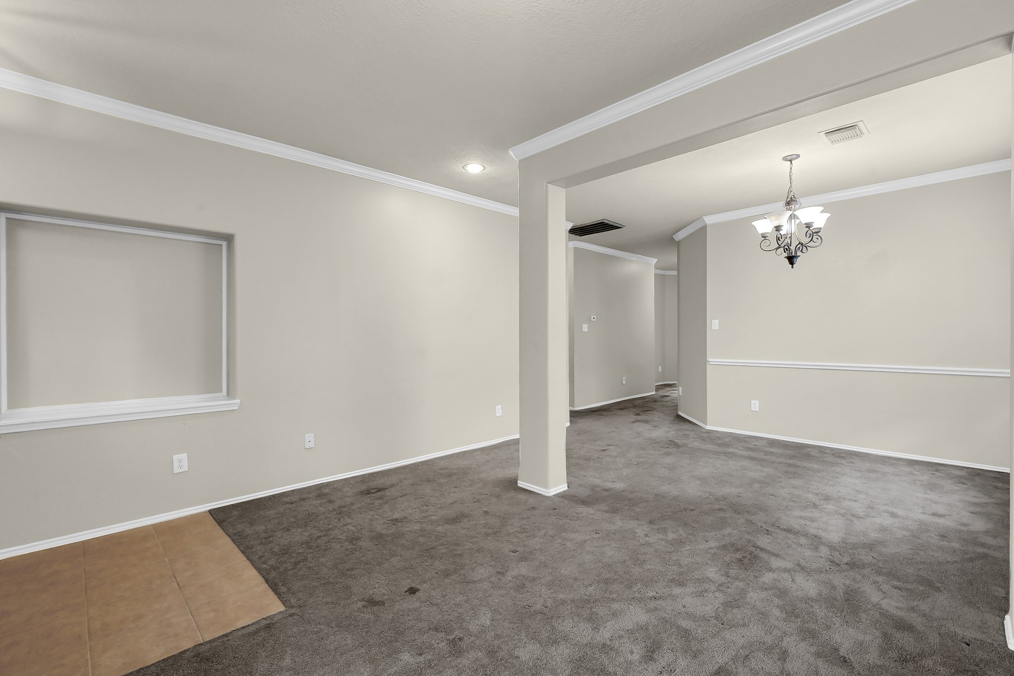 951 Crannog Way Conroe, TX 77301 - Photo 8 of 43 a view of a livingroom with a chandelier