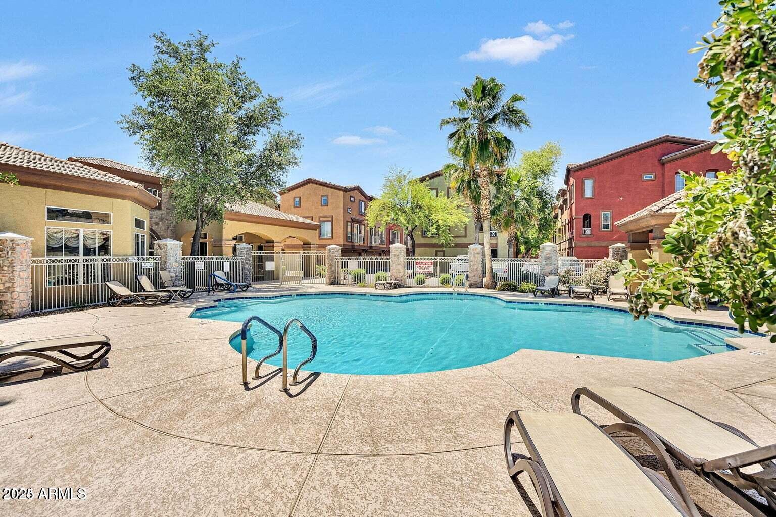 a view of a backyard with a patio
