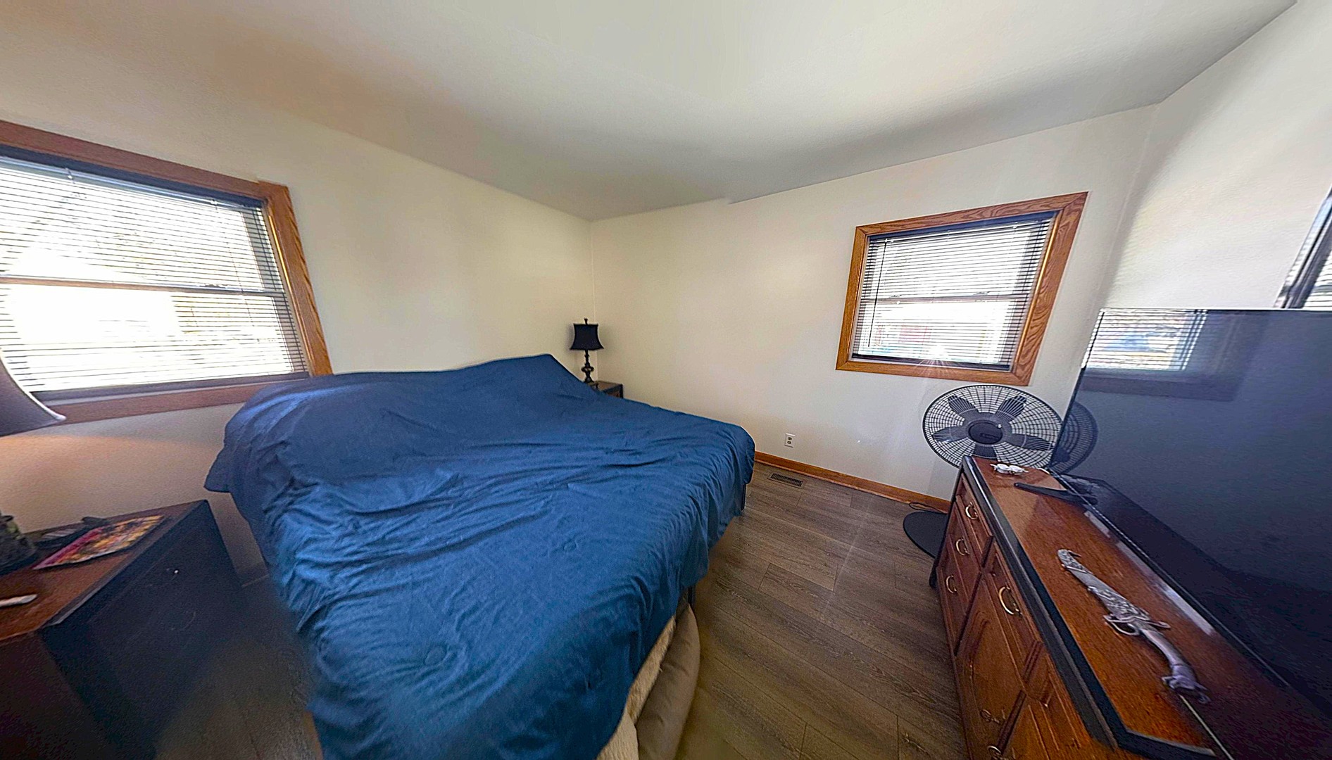 543 Ridge Circle Streamwood, IL 60107 - Photo 9 of 21 a bed sitting in a bedroom next to a window