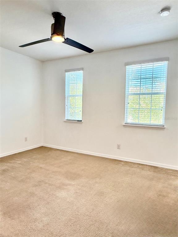619 Fortanini Circle Ocoee, FL 34761 - Photo 14 of 36 an empty room with a window