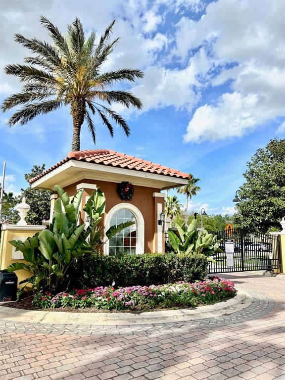 619 Fortanini Circle Ocoee, FL 34761 - Photo 36 of 36 a front view of a house with a garden