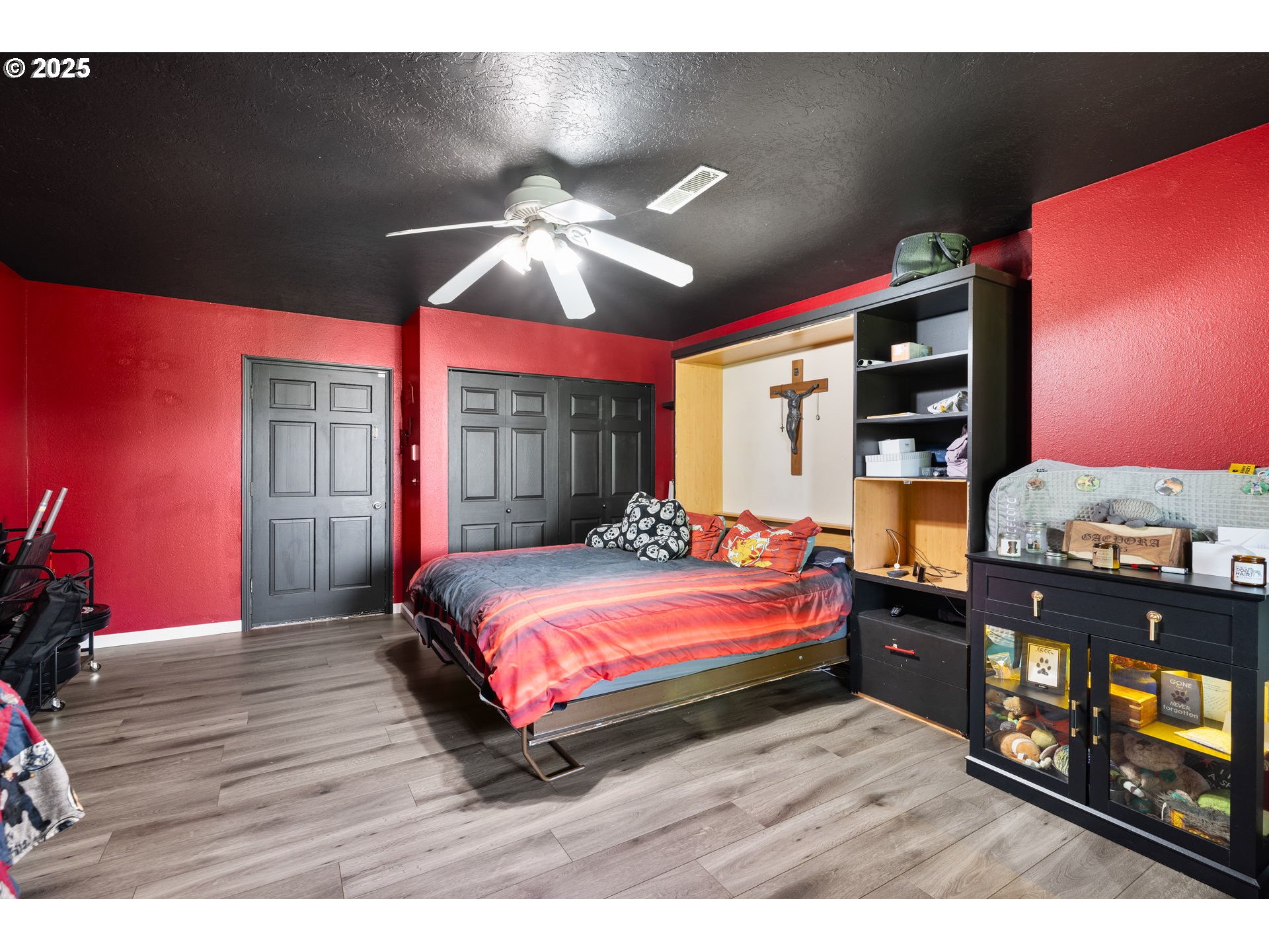 480 Northwest Norman Avenue Gresham, OR 97030 - Photo 21 of 40 a bedroom with a bed and wooden floor