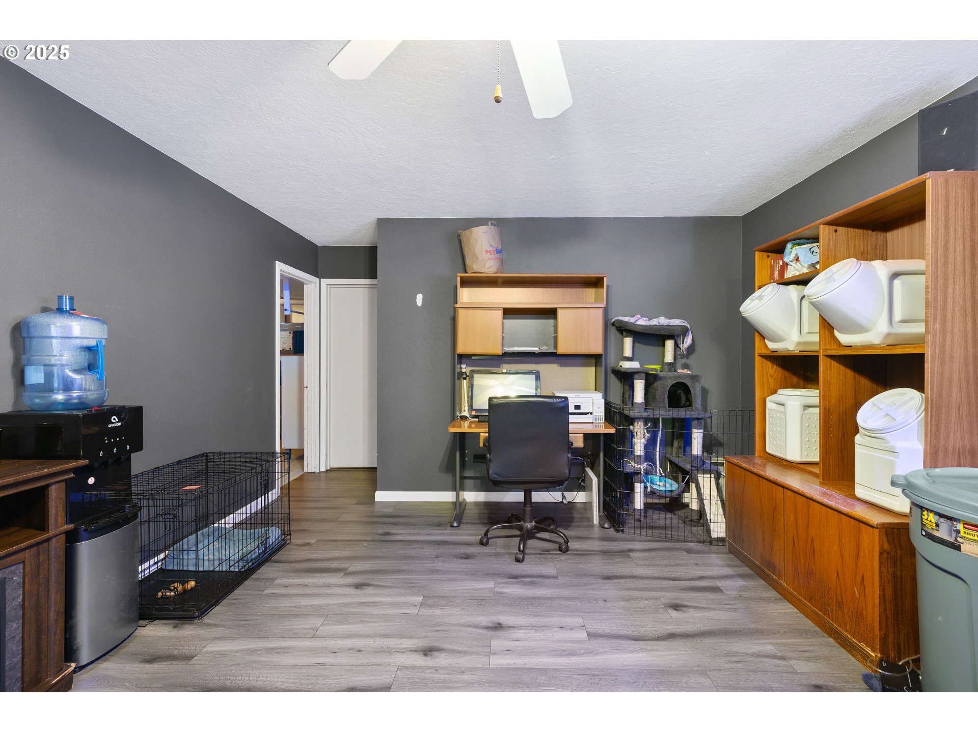 480 Northwest Norman Avenue Gresham, OR 97030 - Photo 25 of 40 a living room with furniture and a flat screen tv