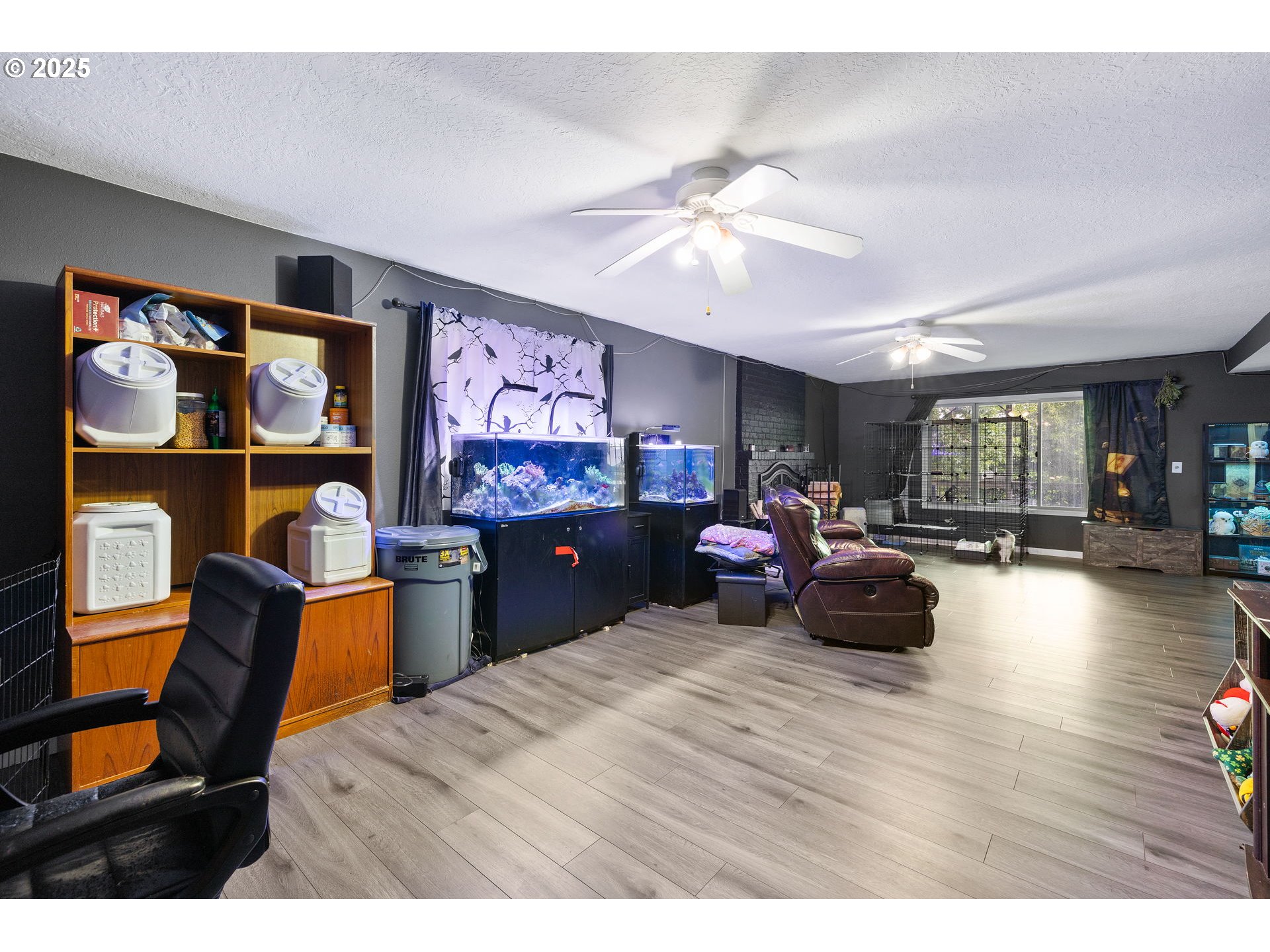 480 Northwest Norman Avenue Gresham, OR 97030 - Photo 26 of 40 a living room with furniture and a flat screen tv