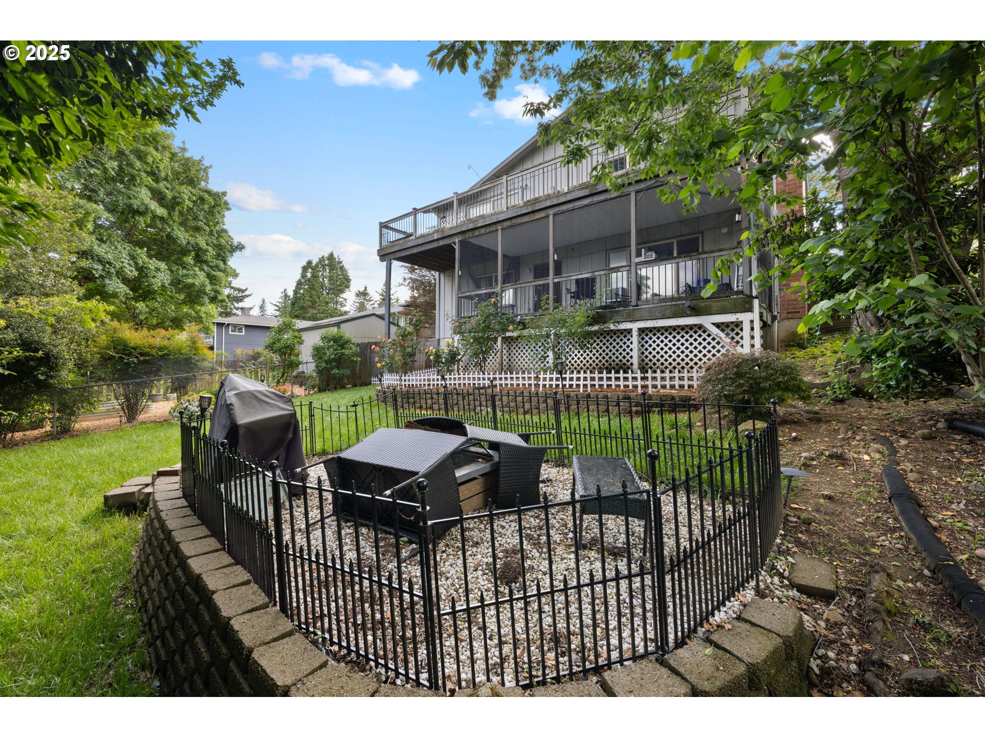 480 Northwest Norman Avenue Gresham, OR 97030 - Photo 34 of 40 a view of a roof deck with couches chairs and a yard