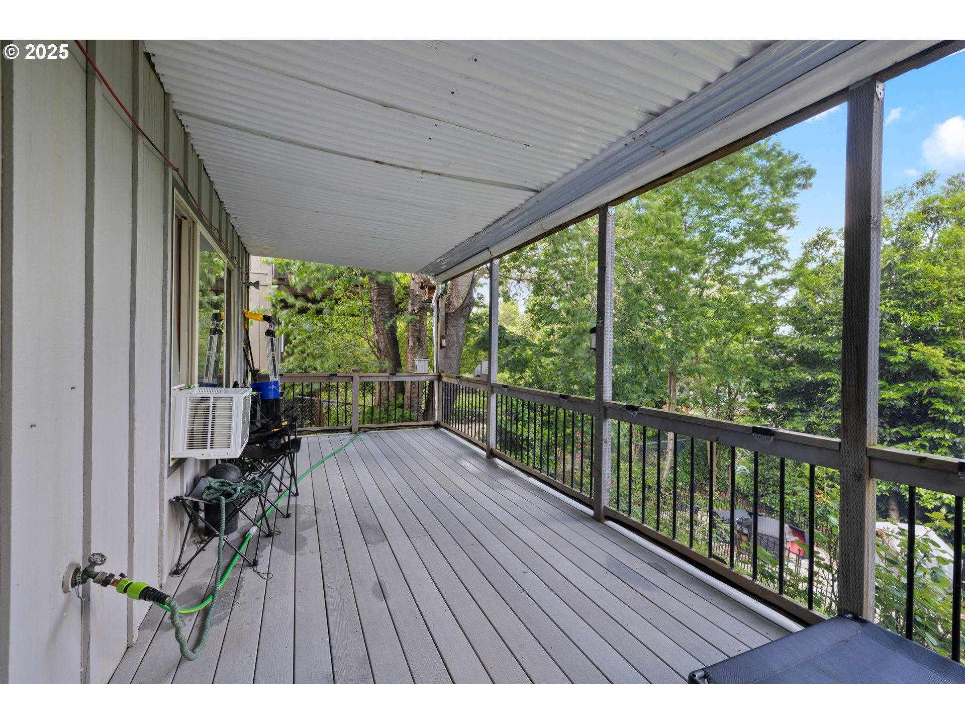 480 Northwest Norman Avenue Gresham, OR 97030 - Photo 35 of 40 a view of backyard with a deck and wooden floor