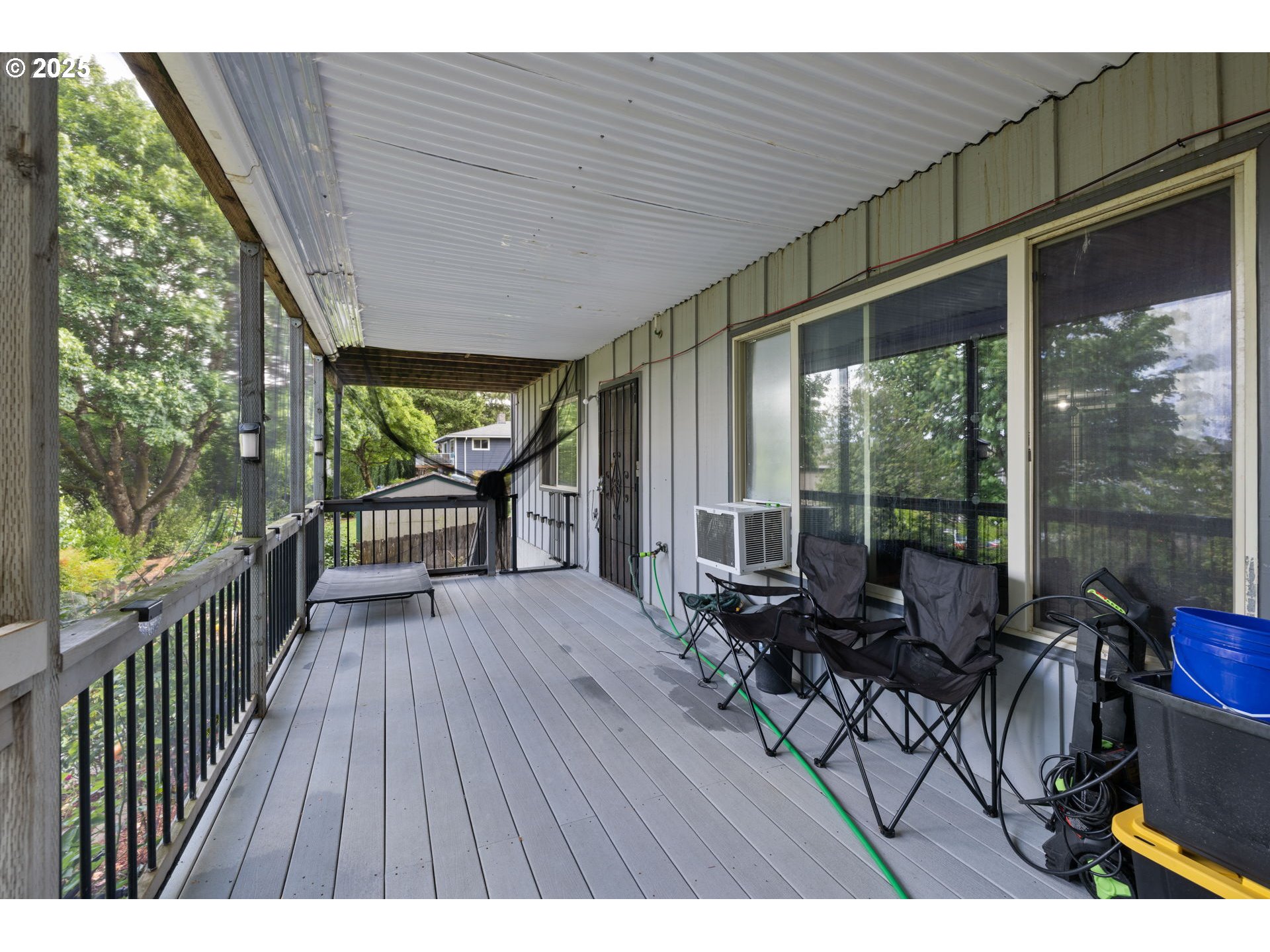 480 Northwest Norman Avenue Gresham, OR 97030 - Photo 36 of 40 a balcony with chairs and wooden floor